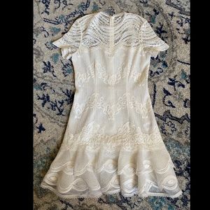 Jonathan Simakhai white dress